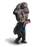 man carrying ape on back