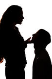 woman forgiving her begging spouse